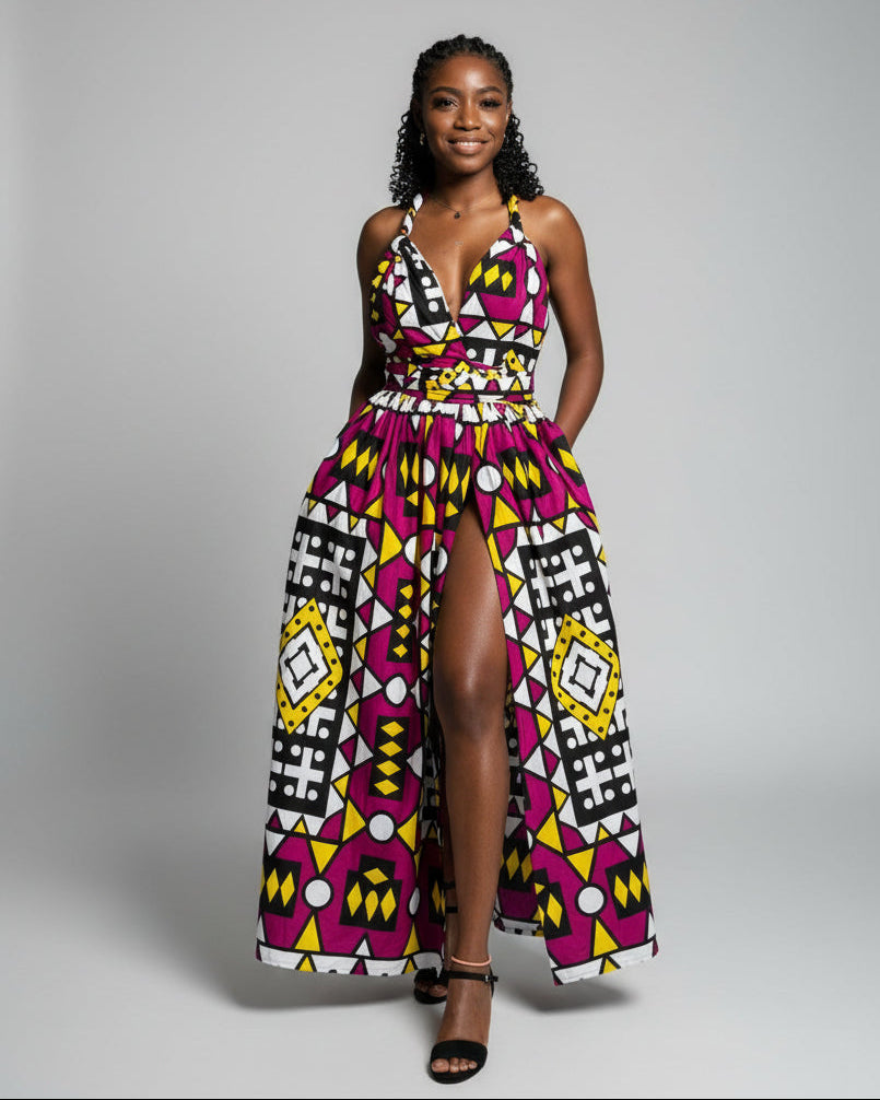 Woman wearing a colorful geometric patterned dress on a gray background
