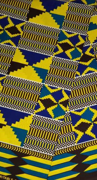 African print fabric with blue, yellow, and black geometric pattern